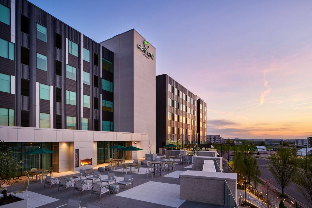 Patio Terrace and Hotel Exterior at Sunrise