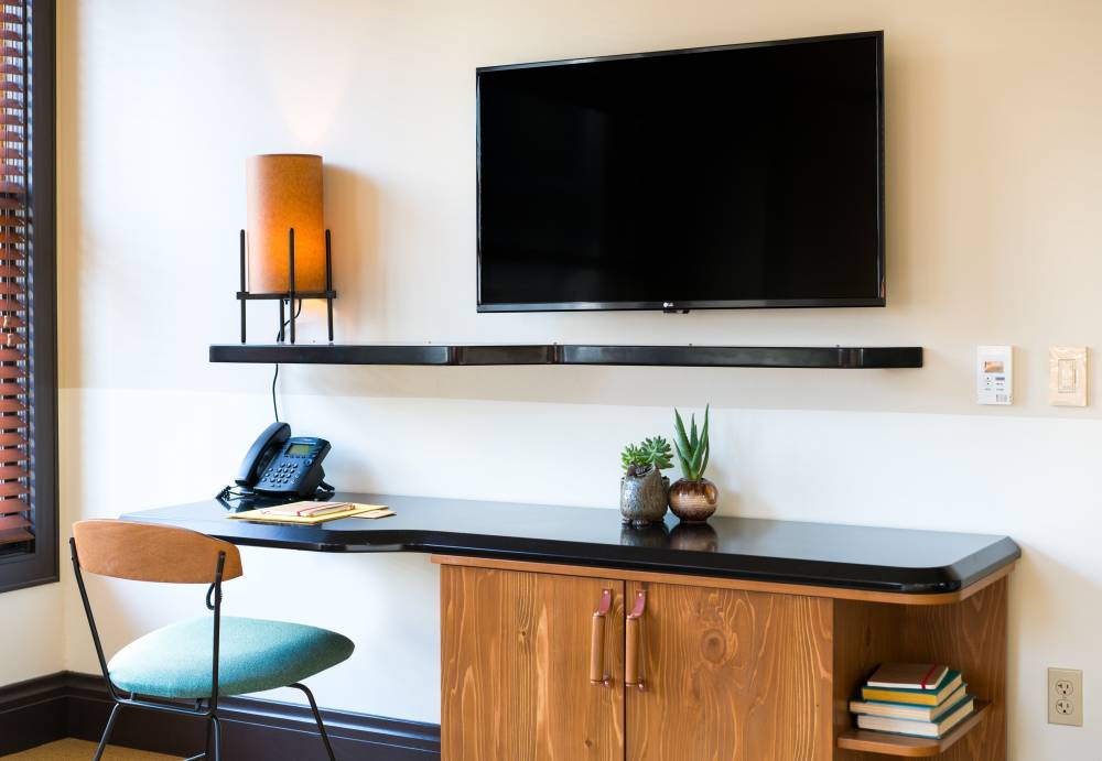 Desk and TV in Deluxe King Corner Studio 