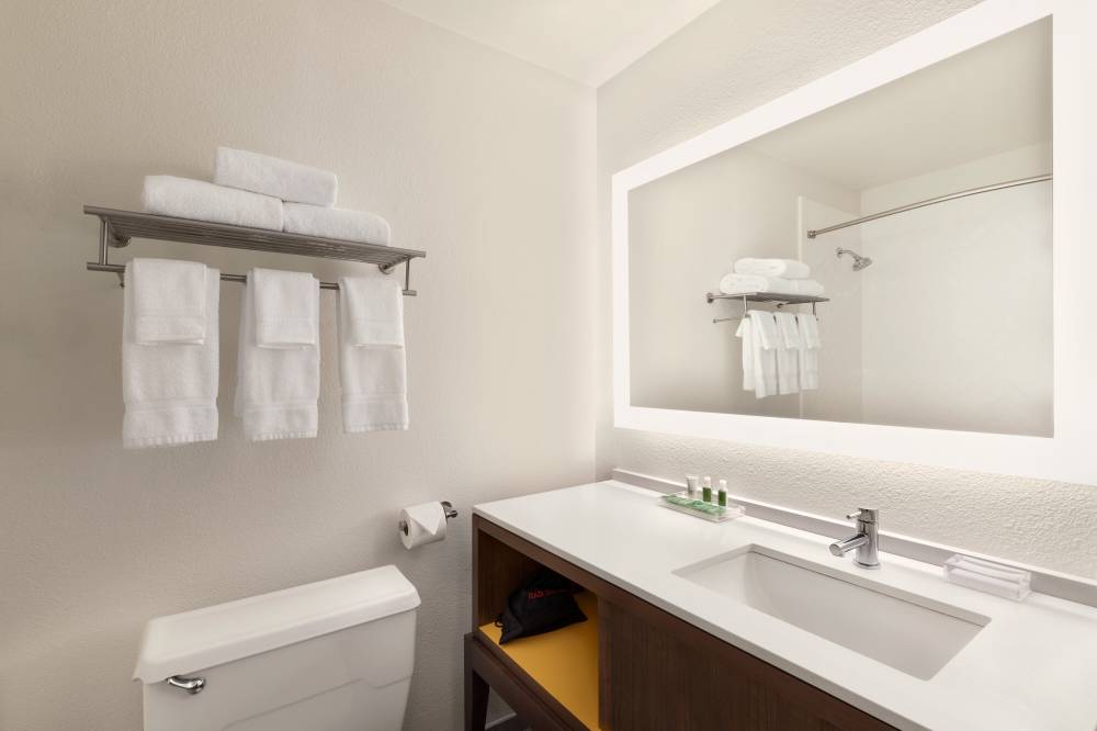 Guest bathrooms feature great lighting & amenities