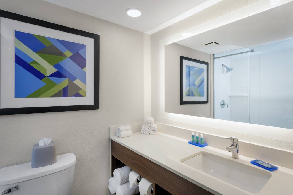 Bathroom with marble surround, LED vanity & oversi