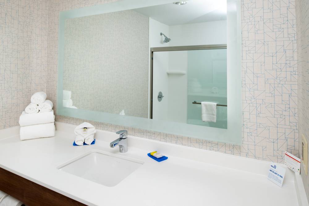 Large back-lit mirror and a spacious vanity