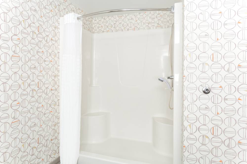 Handicapped bathroom with shower hearing accessibl