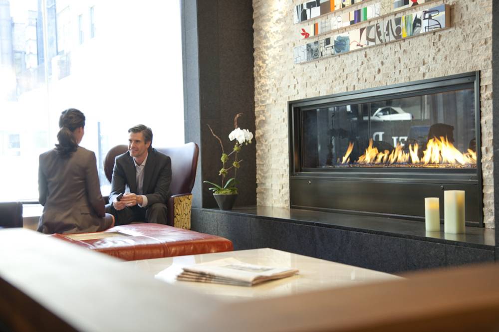 Cozy Guest Lounge fireplace.