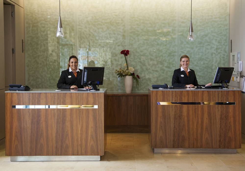 Reception Desk With Staff