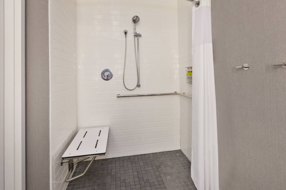 Mobility accessible bathroom designed for easy whe